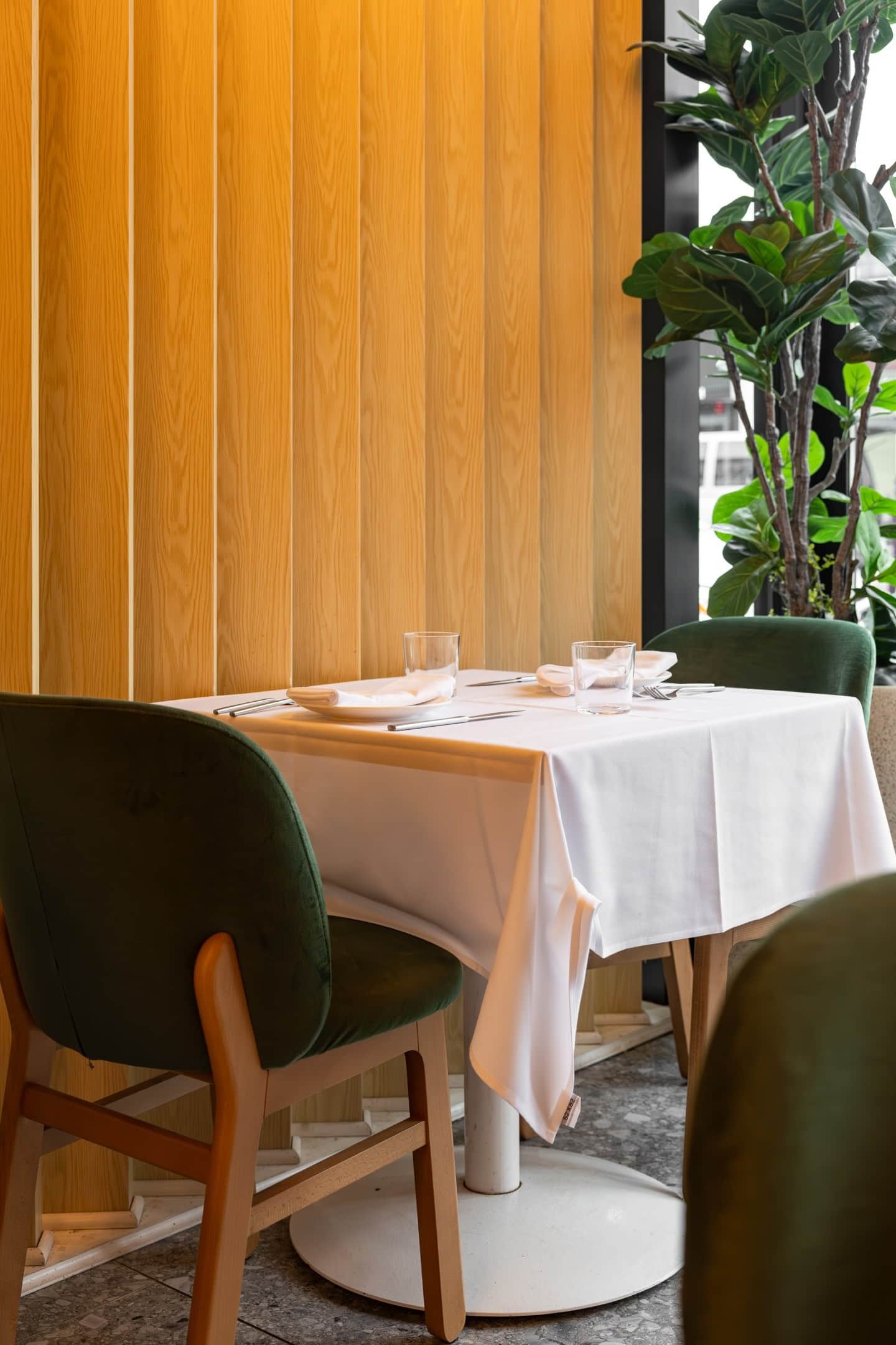 A dressed corner table at Casa Stellina