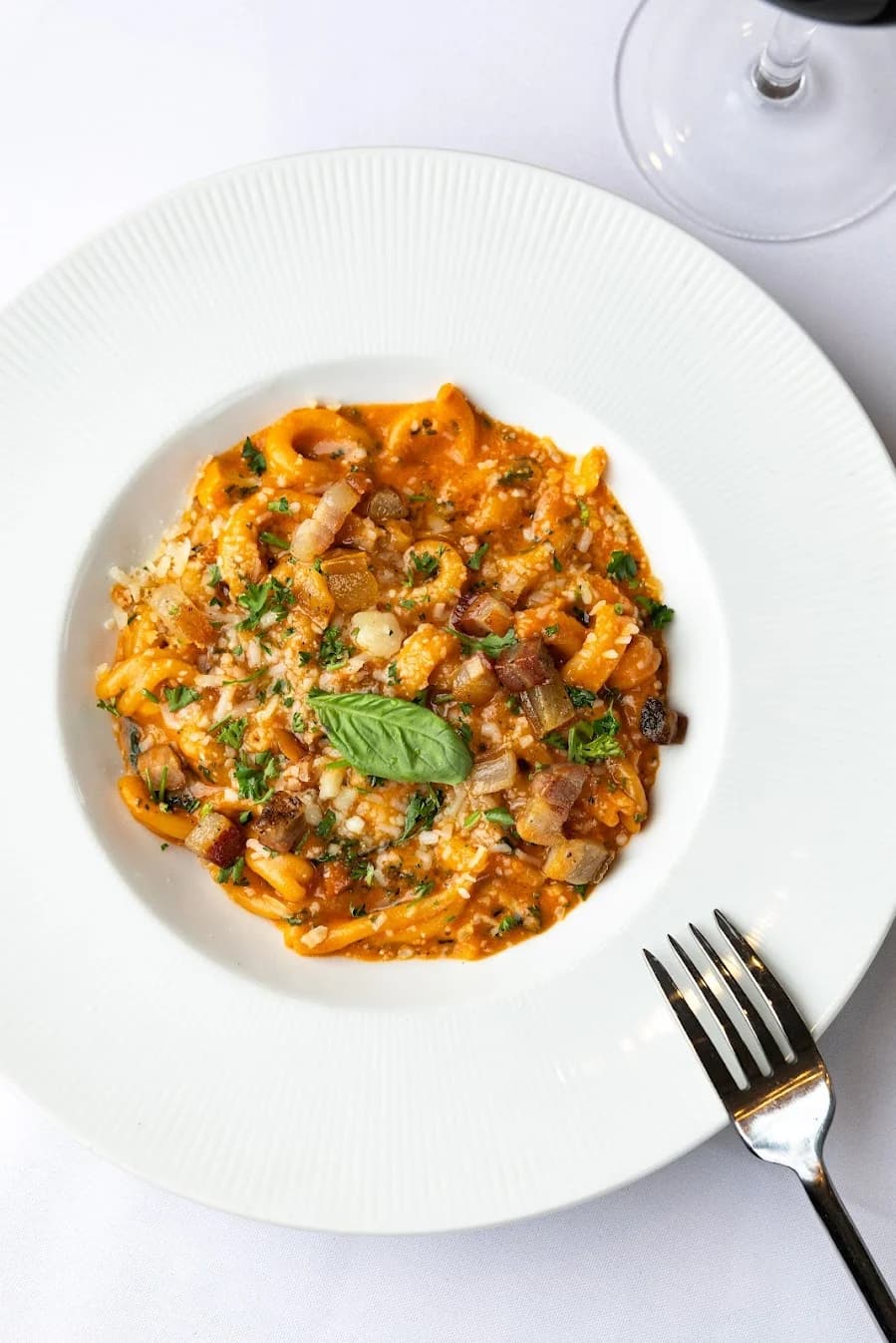 Strozzapretti al Fume — pasta with smoked pancetta and provola