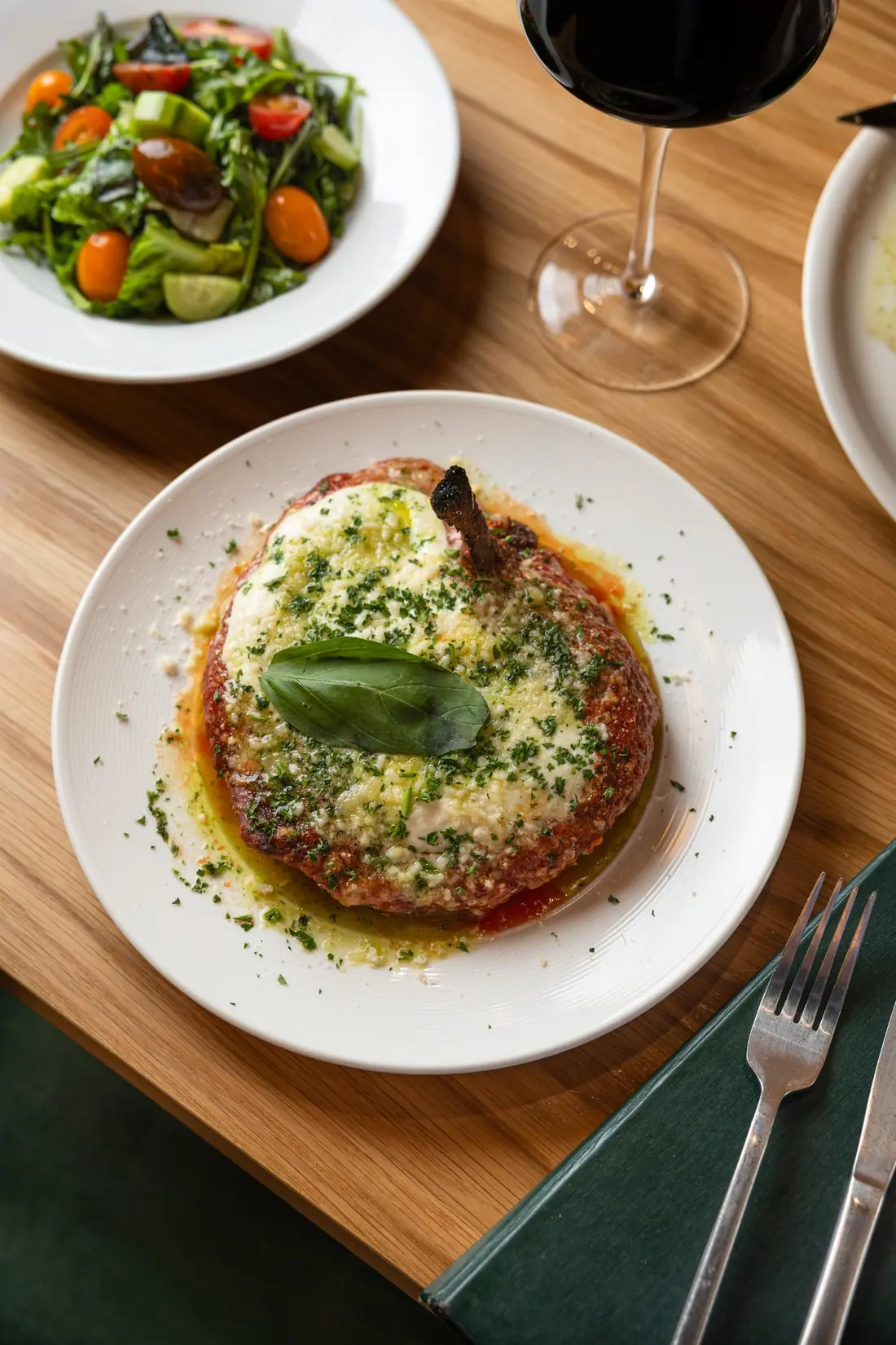 Bone-in chicken parmigiana with burrata