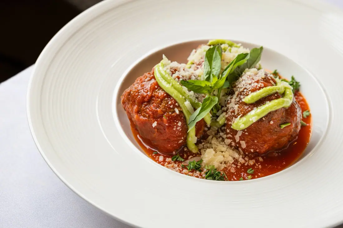 Meatballs in San Marzano tomato sauce, finished with reggiano
